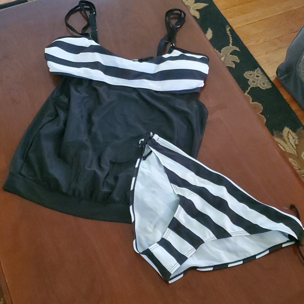 NWOT. Unique tankini set with cutouts